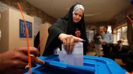 Voting begins in Iraq as violence grips a divided country
