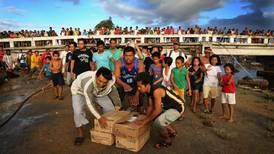 Philippines survivors begin rebuilding shattered lives