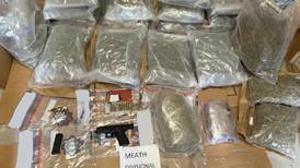 Drugs worth €700,000 and semi-automatic pistol seized in Garda raid