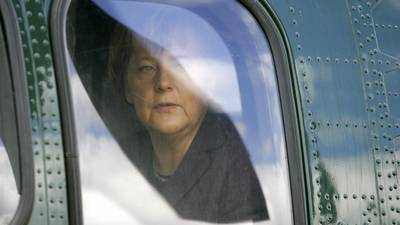 High-flying Merkel under fire over helicopter flight fee discount