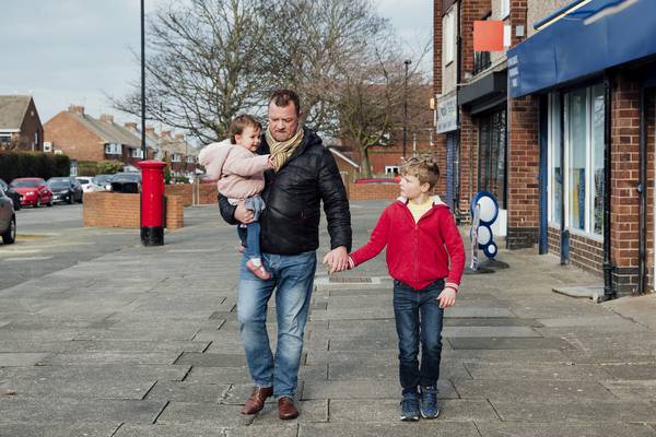 How can new fathers combat the loneliness of childcare?