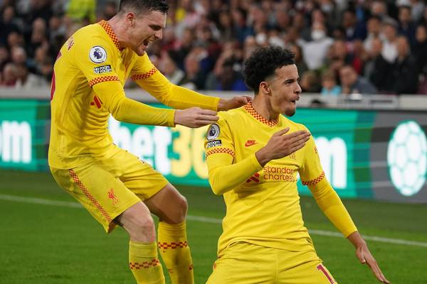 League leaders Liverpool held at Brentford in six goal thriller