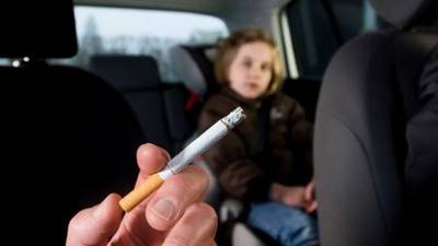 Smoking in cars with children to be banned in North