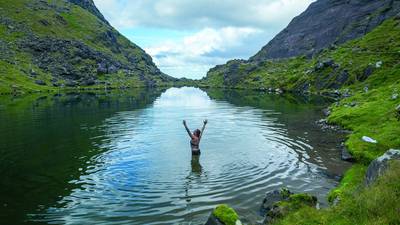 Fancy a swim in Ireland’s highest lake, halfway up Carrauntoohil?