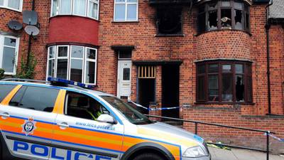 Two   face court  charged with murder over  Leicester fire