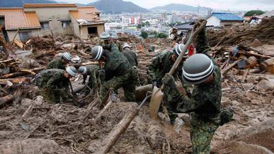 Heavy rain hampers   Japan landslide rescue effort