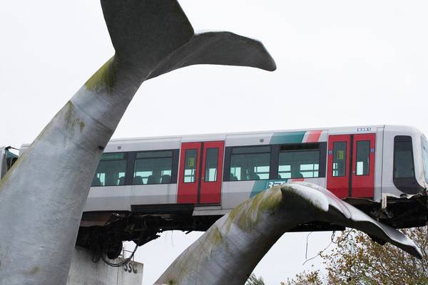 Whale sculpture saves train that ran off elevated railway