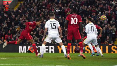 Liverpool hits six past hapless Leeds to close gap on Man City to three points