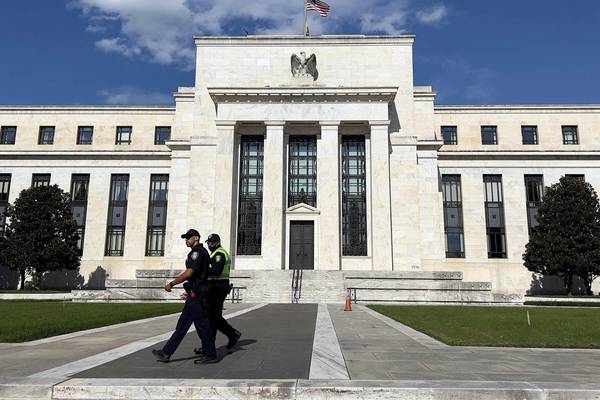 Fed to start winding back its $120bn-a-month bond-buying spree