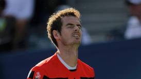 Andy Murray’s title defence ends at hands of inspired Wawrinka