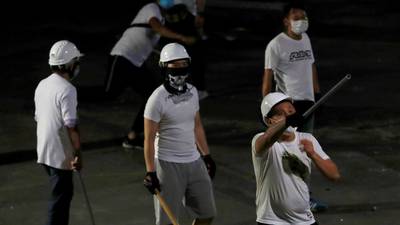 Hong Kong police under fire after ‘triads’ beat protesters