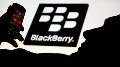 BlackBerry revenue down a third in a year