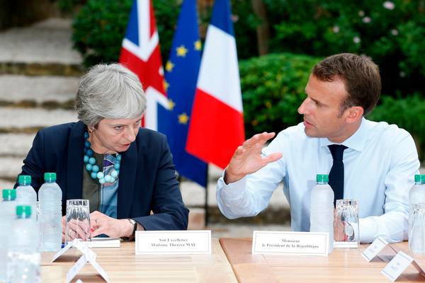 May meets Macron to seek support for Brexit blueprint