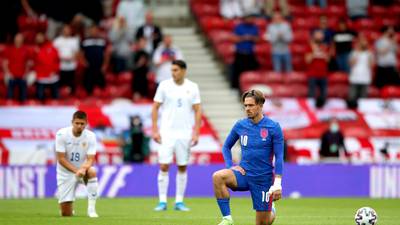 English fans boo the knee again before win over Romania