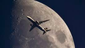 Fly me to the moon: Photographer snaps aircraft using telescope