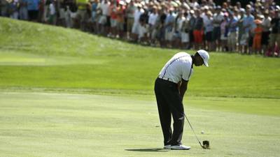 Woods and Mickelson slip further off the pace