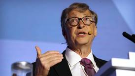 Bill Gates brandishes jar of poo to showcase toilet revolution