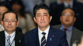 Japanese prime minister fights for his political life