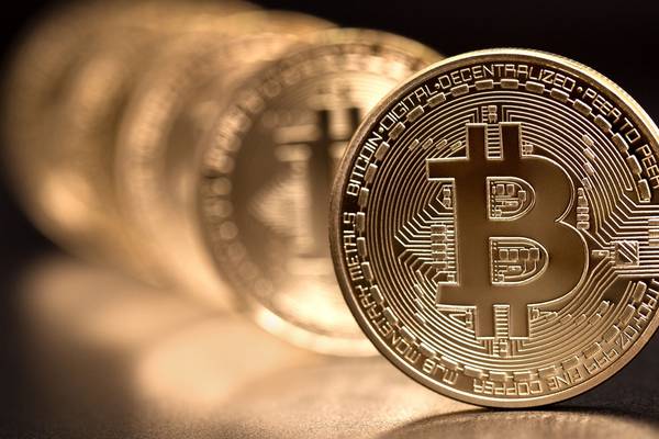 Bitcoin slides 14% on crackdown fears, hits four-week low