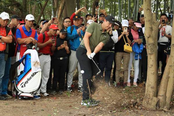 Slow start for Rory McIlroy as Reed sets the pace in China