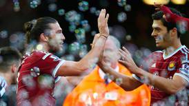 Andy Carroll inspires West Ham to victory over Swansea