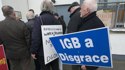Greyhound owners protest at Simon Coveney’s Cork office