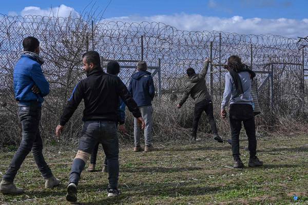 Teargas fired on Greek-Turkish border as migrant tensions flare