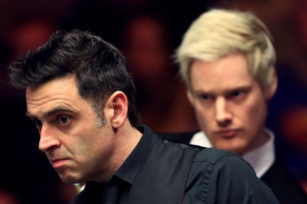 Ronnie O’Sullivan defies illness to see off Neil Robertson