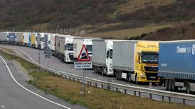 Brexit talks continue as lorries queue for miles at Eurotunnel