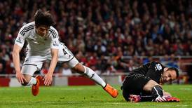 Swansea get over the line to end Arsenal's run