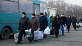 Ukrainian forces and rebels exchange POWs as war grinds on