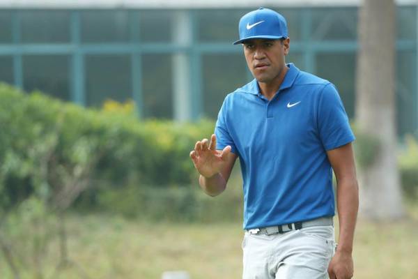 Tony Finau forges ahead in China as Rory McIlroy falters