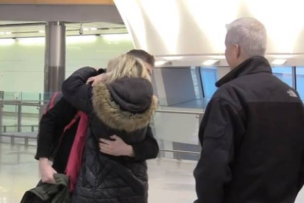 Hugs and tears at Dublin Airport as families part after Christmas