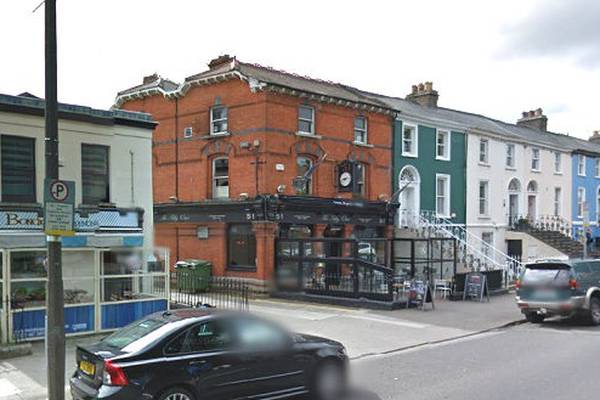 Masked men raid south Dublin pub with gun and large knife