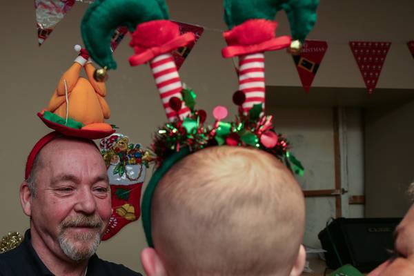 Santa arrives with presents and reassurances at party for homeless children