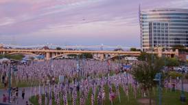 Saying the names of the 2,996 who died on 9/11, we remember them