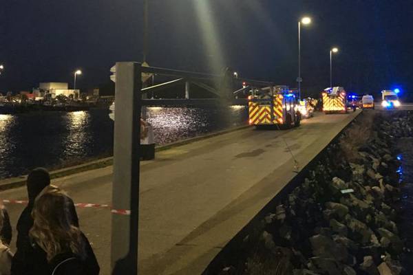 Car falls into Howth harbour; emergency services at scene