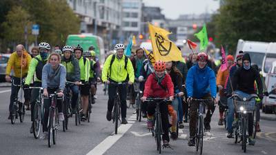 Dubliners stage slow cycle in solidarity with Extinction Rebellion
