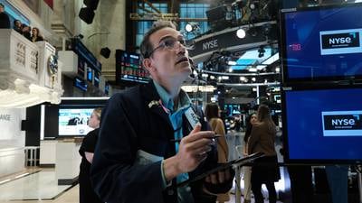 Global markets rally as traders expect interest rates to peak soon
