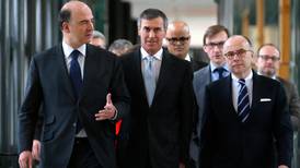 Hollande sacks budget minister under investigation for tax fraud