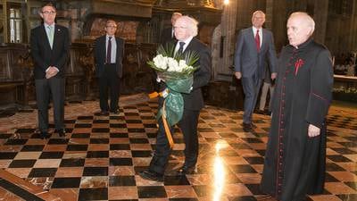 Higgins lays floral tribute to Spain’s train crash victims