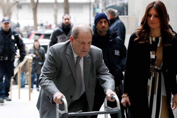 Judge threatens to revoke Weinstein’s bail over phone in court