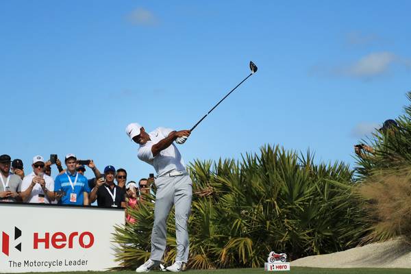 Tiger Woods back on the leaderboard and turning heads