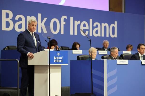 Outgoing Bank of Ireland chairman decries bonus cap 