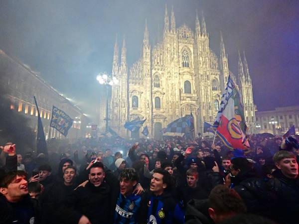 Inter fans celebrate Serie A title win in front of Milan's Duomo