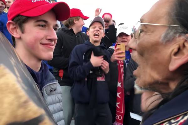 Students in Trump hats mock Native American activist in Washington