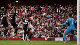 Arsenal stroll by dismal Stoke to move to second