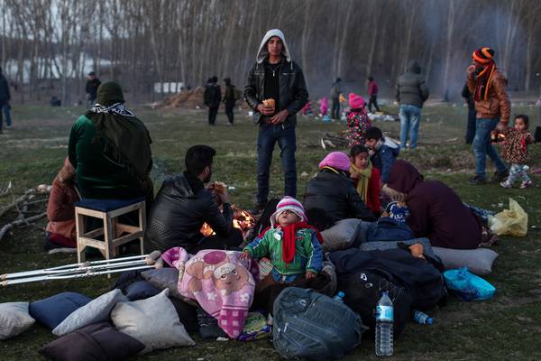 Migrants mass on Turkish-Greek border to try to enter EU