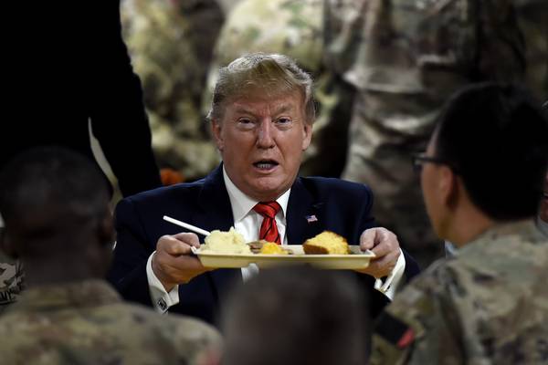 Trump visits troops in Afghanistan and says Taliban considering ceasefire