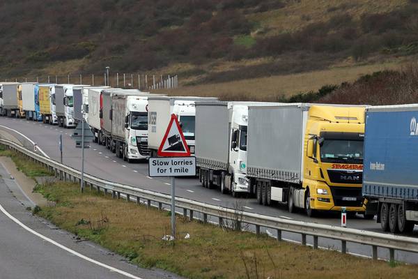 Brexit talks continue as lorries queue for miles at Eurotunnel